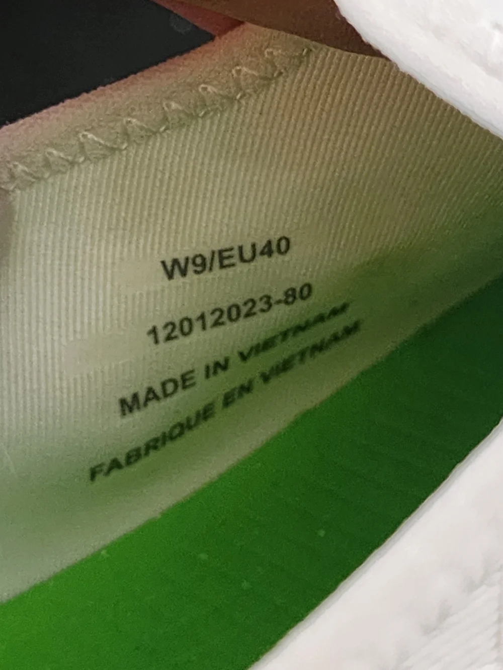 OOFOS Women's White Slip-On Athletic Shoes with Neon Green Insole